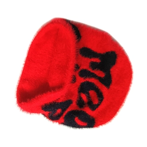 Bright red plush knit beanie featuring black letter embroidery for a cozy winter look