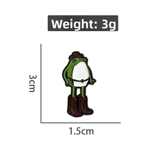 Detailed view of cowboy frog enamel pin with size and weight measurements included