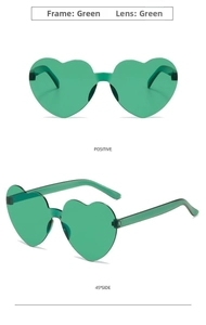 Close-up of green heart-shaped rimless sunglasses showing front and side views