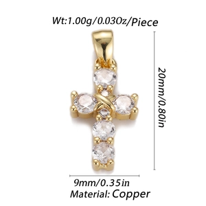 Macro shot showing dimensions and 1g weight of gold-plated cross pendant with zircons
