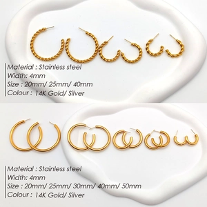 Polished and twisted stainless steel hoop earrings in 14K gold and silver finishes