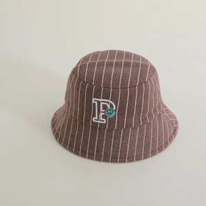 Close-up of brown striped woolen bucket hat featuring letter P and smiley embroidery