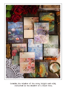 Flat lay of vintage scrapbooking paper set with floral oil painting designs, 100 sheets
