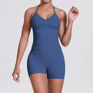 Close-up of blue halter neck sports bra and high-waisted seamless yoga shorts set