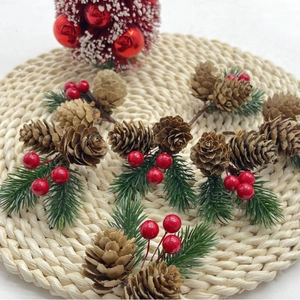 Artificial pine cones with red berries and pine needles for Christmas DIY home decor
