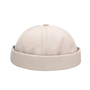 Minimalist beige cotton docker cap with rolled edge and retro sailor style design