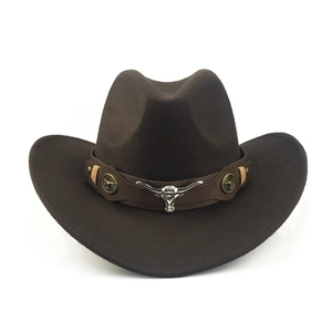 Detailed view of brown felt cowboy hat with silver bull head buckle and vintage accents