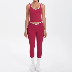 Detail showing Burgundy yoga set with V-shaped cross high waist and white contrast piping