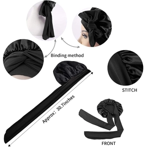 Detail of black satin hair bonnet with 30.7 inch adjustable long straps and stitching