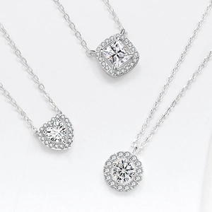 Elegant halo set silver necklaces featuring square, heart and round cut zircon pendants
