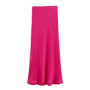 Detailed close-up of rose red satin midi skirt showing smooth texture and elegant drape