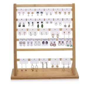 Macro detail of a 5-tier bamboo earring display stand with reinforced stable base