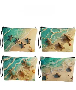 Detail display of four canvas turtle makeup bags with vibrant beach theme prints