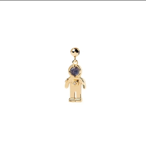 Detailed view of a golden astronaut pendant featuring a blue starry stone visor