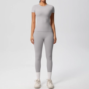 Front view of grey two-piece workout set with slim fit tee and high elastic yoga leggings
