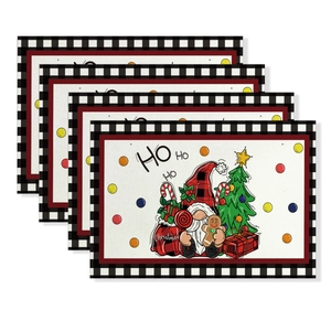 Set of four Christmas placemats with gnomes and plaid borders on white background