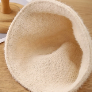 Handmade crochet double-sided bucket hat in cream faux rabbit fur with plush texture