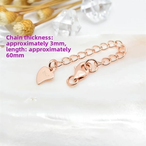 Rose gold 925 silver extender chain detail with lobster clasp and heart charm, length 60mm