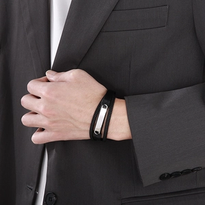 Men's multi-layer braided leather bracelet with a polished silver stainless steel plate