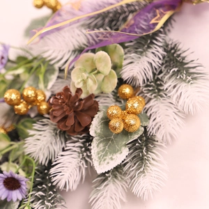 Lighted Christmas upside down tree with purple ribbons and gold glitter berries decor