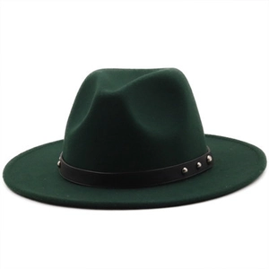 Close-up of a dark green wool fedora hat featuring a black belt with silver rivets