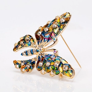 Elegant butterfly brooch with colorful enamel and sparkling rhinestones on a gold base