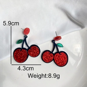 Detail of glitter-filled acrylic cherry earrings with measurements 5.9cm x 4.3cm