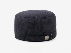 Detail view of winter wool flat cap rear with adjustable metal buckle and twill texture