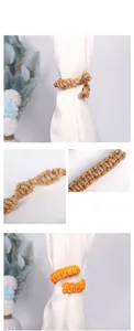 Detail of hand-woven cotton and linen rope curtain tiebacks with intricate braided texture