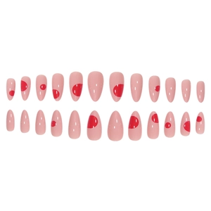 Set of 24 almond press-on nails with nude pink base and minimalist red polka dot patterns