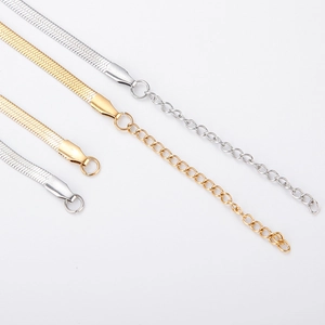 Flat stainless steel snake chain necklaces in gold and silver with adjustable extenders