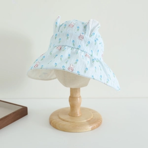 Detail of light blue sun hat with 3D bunny ears and floral tulip print for kids