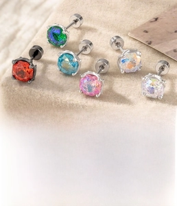 Macro shot of titanium steel cartilage studs with multi-color cubic zirconia in 0.8x6mm size
