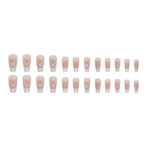 French tip coffin press-on nails with nude pink base, pearls, and rhinestone accents