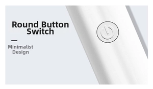 Close-up of the circular power button on a white portable handheld nail lamp with matte finish
