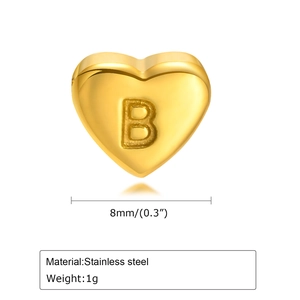 Detail of 8mm gold heart-shaped stainless steel charm with engraved letter B