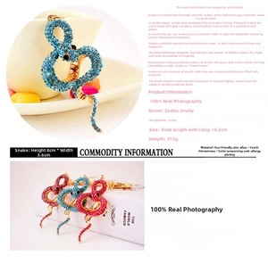Detail of snake keychain with sparkling blue, red, and pink crystals on zinc alloy