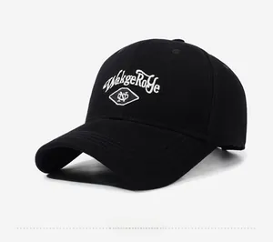Close-up of white WakgeRofe embroidery on a high-quality black twill cotton baseball cap