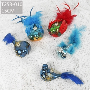 Detailed view of bird-shaped Christmas tree ornaments with feathers and glitter, 15cm long