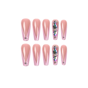 Pink long coffin press on nails with rhinestone accents and V-shaped French tips