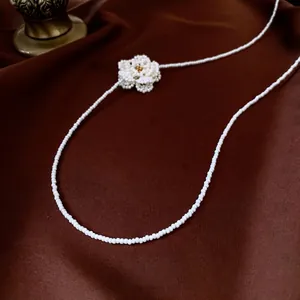 Elegant white pearl necklace featuring a 3D handcrafted camellia flower pendant for women