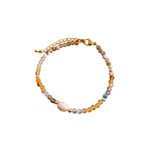 Handmade beaded necklace with natural orange agate, grey stones and a white pearl centerpiece