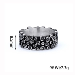 Detailed view of vintage Celtic pattern ring with 8.5mm width and textured oxidized finish