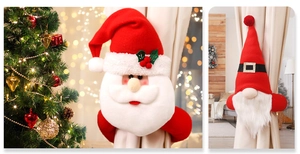Close-up of plush Santa and Gnome curtain tiebacks used for Christmas home decoration