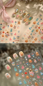 Detail of 3D embossed winter pet nail art stickers with cute bear and penguin patterns