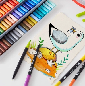 Dual-tip watercolor marker set with brush and fine tips in a portable storage box