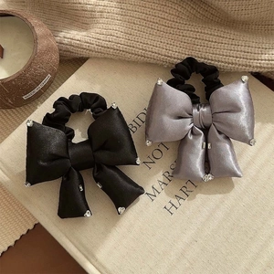 Elegant satin bow hair ties with sparkling rhinestones in black and silver-grey colors