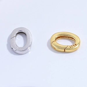 Macro view of S925 sterling silver oval spring clasps in gold and silver finishes