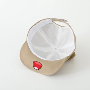 Detail view of khaki baby cap interior showing sweatband and adjustable velcro strap