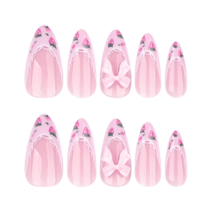 Pink almond press-on nails with 3D bows and strawberry patterns for a sweet French style